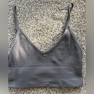 Out from under tank/bra